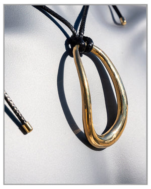 Gold Dipped Oval Cord Tied Adjustable Necklace, Trendy, Fashionable, Unique, Elegant, Bold.